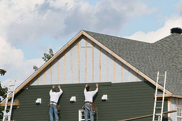 Professional Siding Contractor technician working in Elmont, NY
